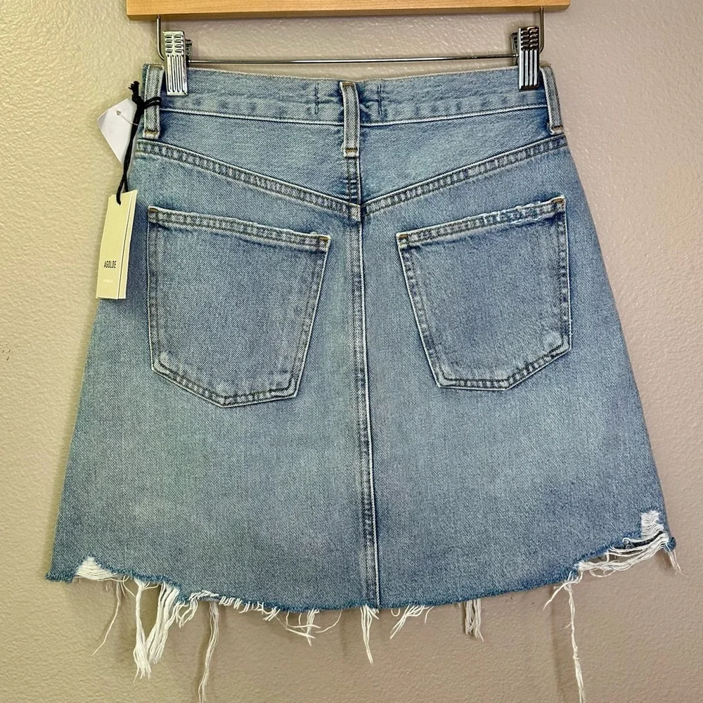 NWT Agolde Criss Cross Jean Mini Skirt Distressed Light Blue Frayed Hem Denim